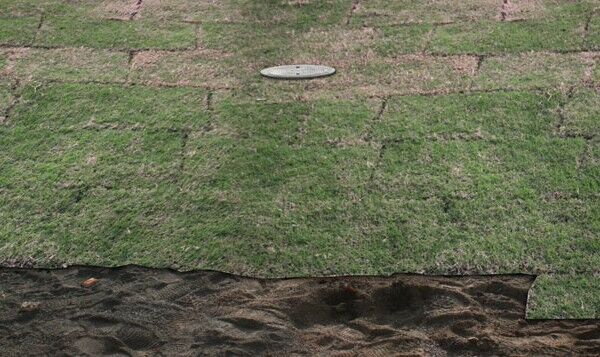2-underground-water-tank-hidden-with-grass-600x357